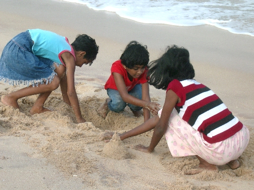 tsunami-survivor-children-return-to-the-sea-in-suduwella-southern-sri-lanka.jpg