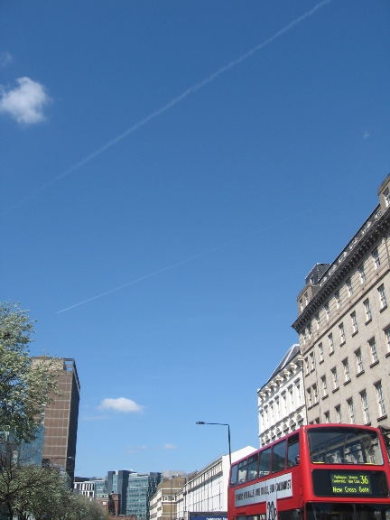 Vapour trails mark the return of flights to London skies, 21 April 2010