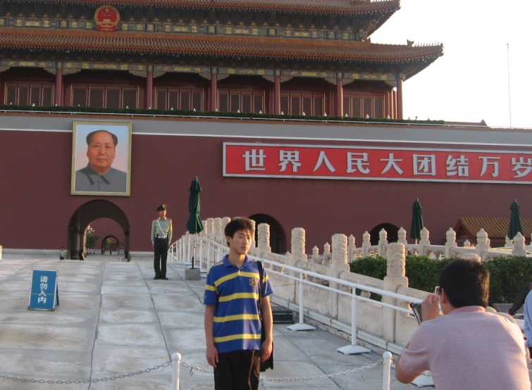 Look serious, he's watching!