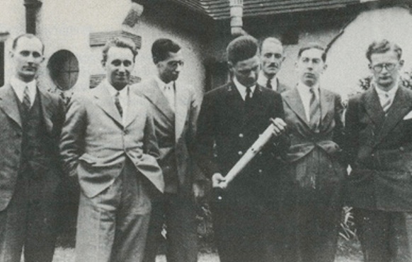 Arthur C. Clarke (far right) and other members of the British Interplanetary Society had a visit from rocket pioneer Robert Truax (holding the rocket model) in 1938
