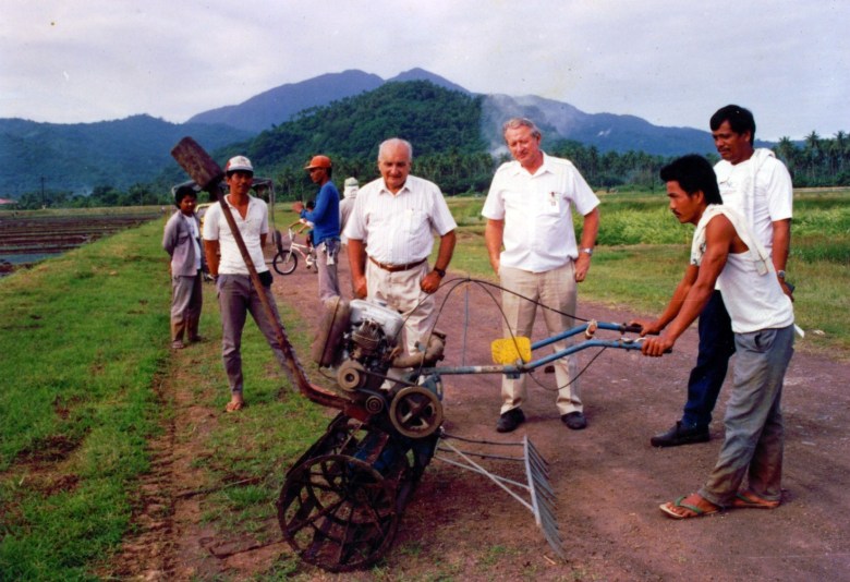 Ray Wijewardene with farmers in the Philippines