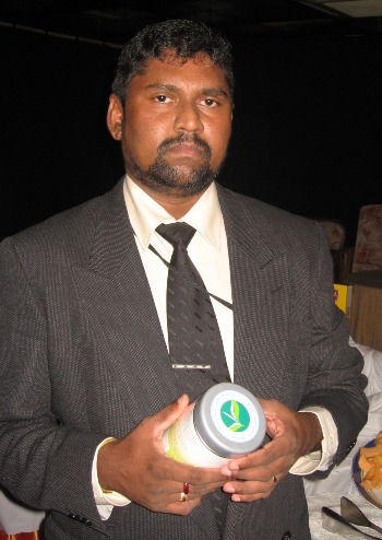 Janaka Gunawardana, Director of the National Ozone Unit with ozone friendly Ceylon Tea