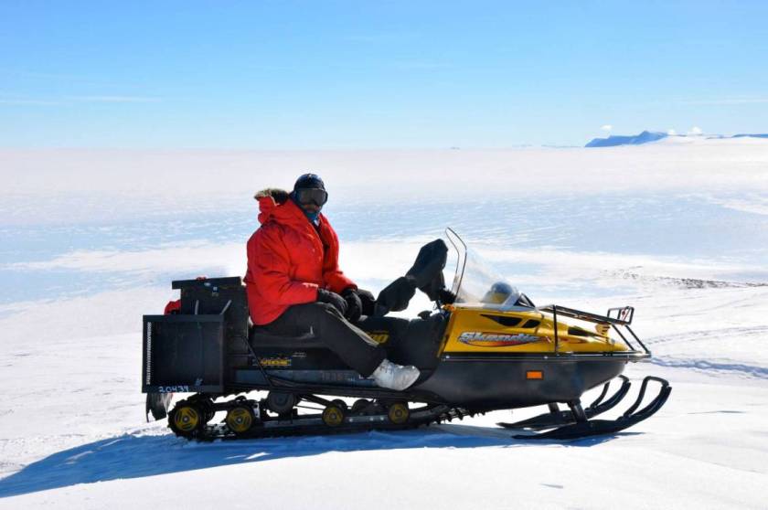 Dr Ray Jayawardhana in Antarctica on snowmobile