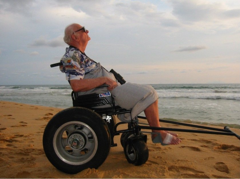 Sir Arthur Clarke revisits Hikkaduwa beach in souther Sri Lanka in his custom-made Dune Roller, circa 2005