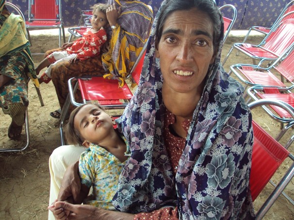 Iodine deficiency is a common cause of goiters, an affliction visible in this woman and child in Nothiya, Pakistan, a village on the outskirts of Islamabad (Photo courtesy - Network for Consumer Protection)