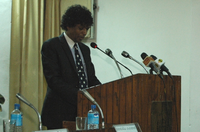 Professor Dammika Ganganath Dissanayeke reads award citation for best newspaper column 2012 at Vidyodaya Lit Award ceremony, 2 Sep 2013. Photo by Janaka Sri Jayalath