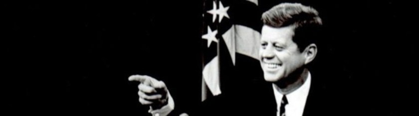jfk at press conference smiling