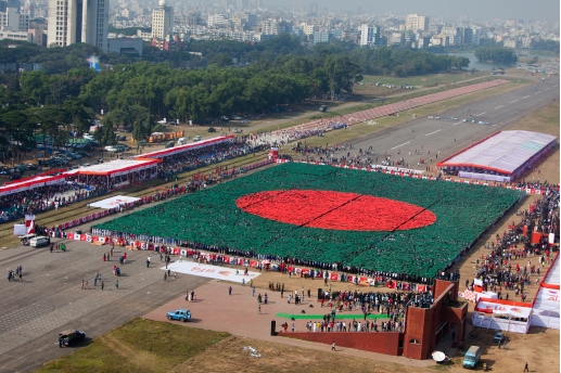 Bangladesh human national flag created at the National Parade Ground in Sher-e-Bangla Nagar in Dhaka on 16 December 2013. Photo by Shahidul Alam/Drik News
