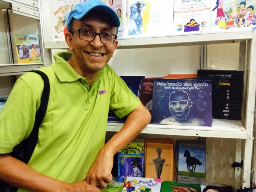 Nalaka Gunawardene at Colombo International Book Fair 2014 where his book 'Tharu Atharata Giya Daruwa' is on sale - Photo by Dhara Gunawardene