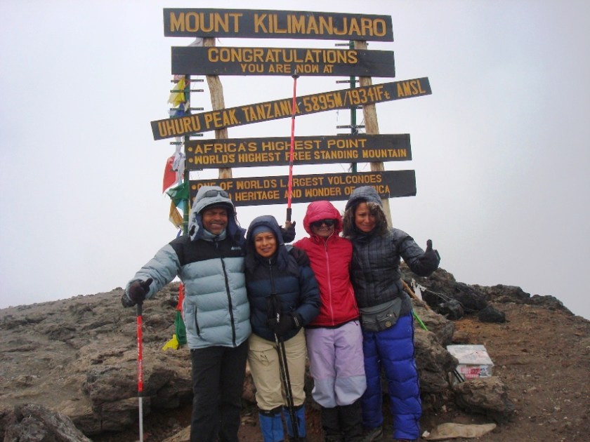 At the Summit of Kilimanjaro, highest peak in Africa - Johann Peries on extreme left Jayanthi Kuru-Utumpala 3rd from left